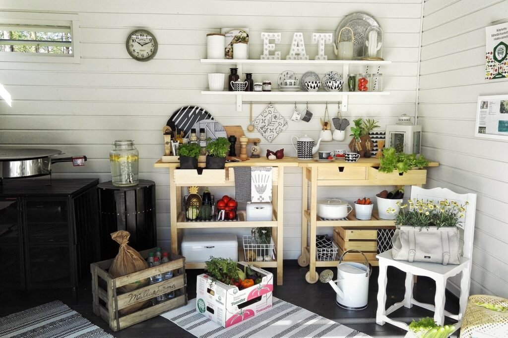 a kitchen scene with wood walls plants and a chair