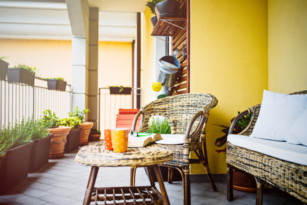 Balcony patio with intimate seating and vegetable garden