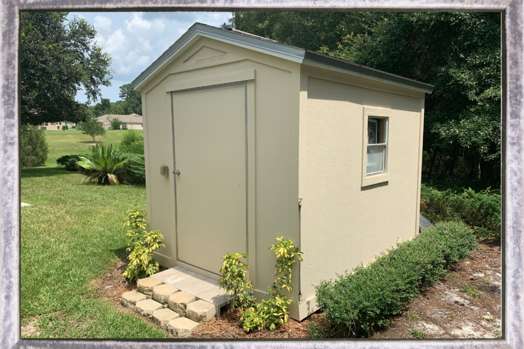 Backyard shed with bushes