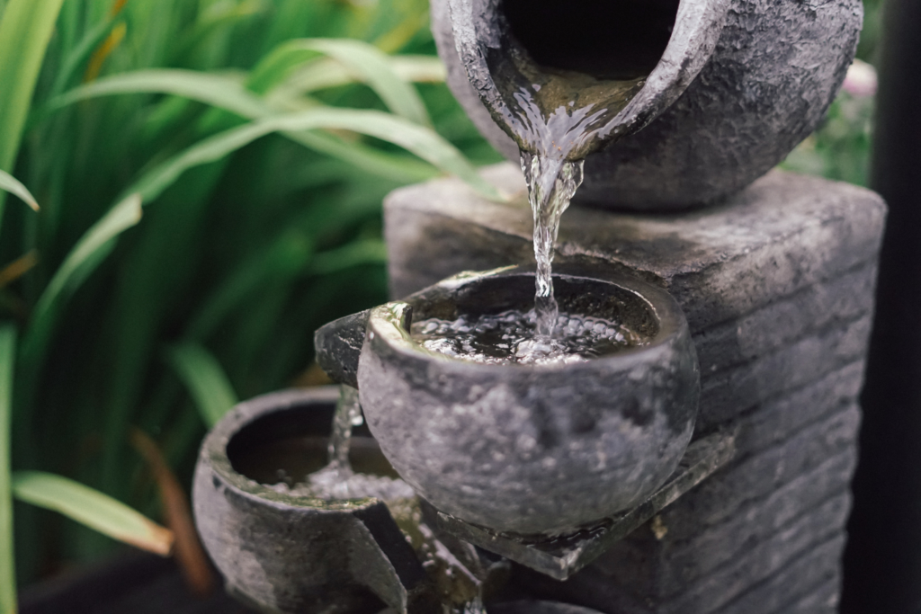 Indoor water fountain with plants