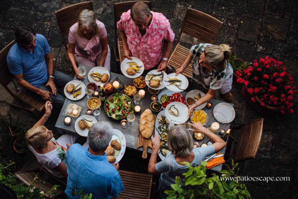 people dining at a patio table